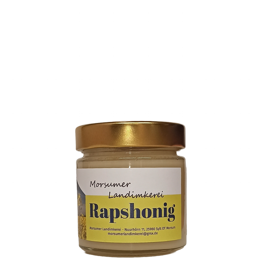 Honigglas Morsumer Landimkerei Rapshonig in runder Glasform mit goldenem Deckel und einem weiß-gelben Etikett mit der Aufschrift Rapshonig.